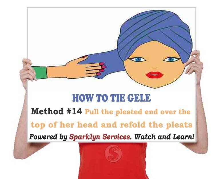 Pull the pleated end over the top of her head and refold the pleats