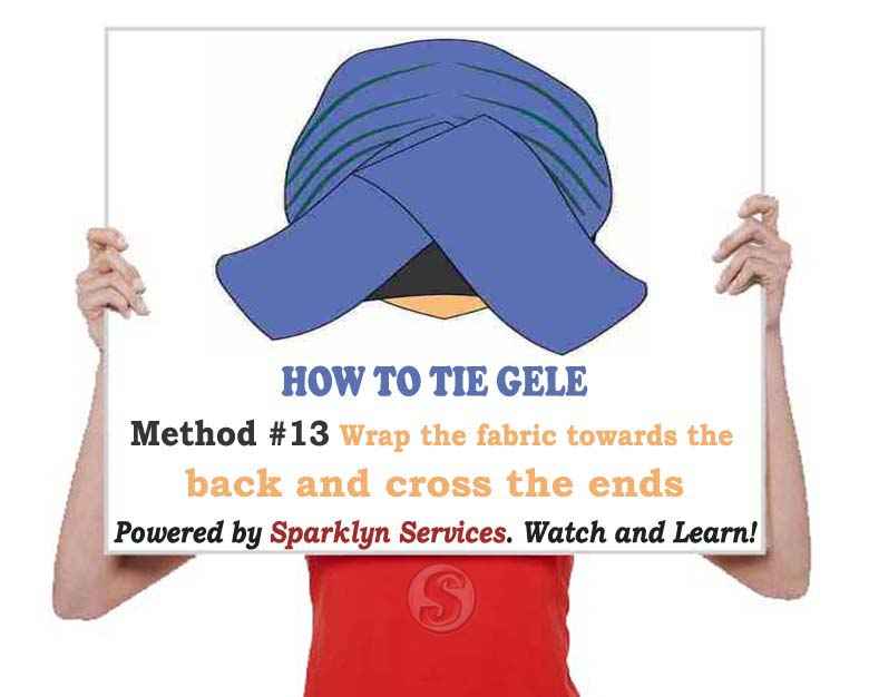 Wrap the fabric towards the back and cross the ends